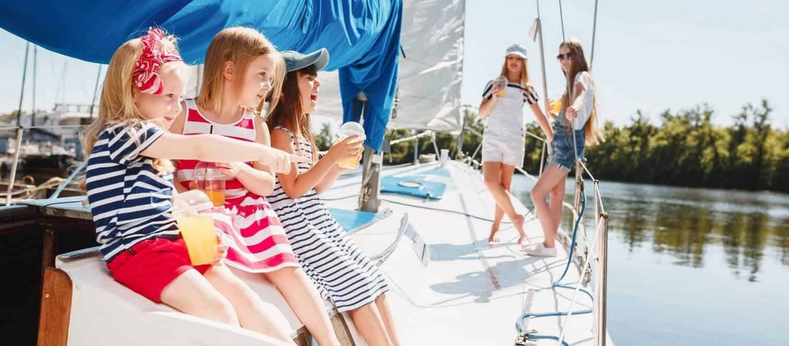 children-board-sea-yacht
